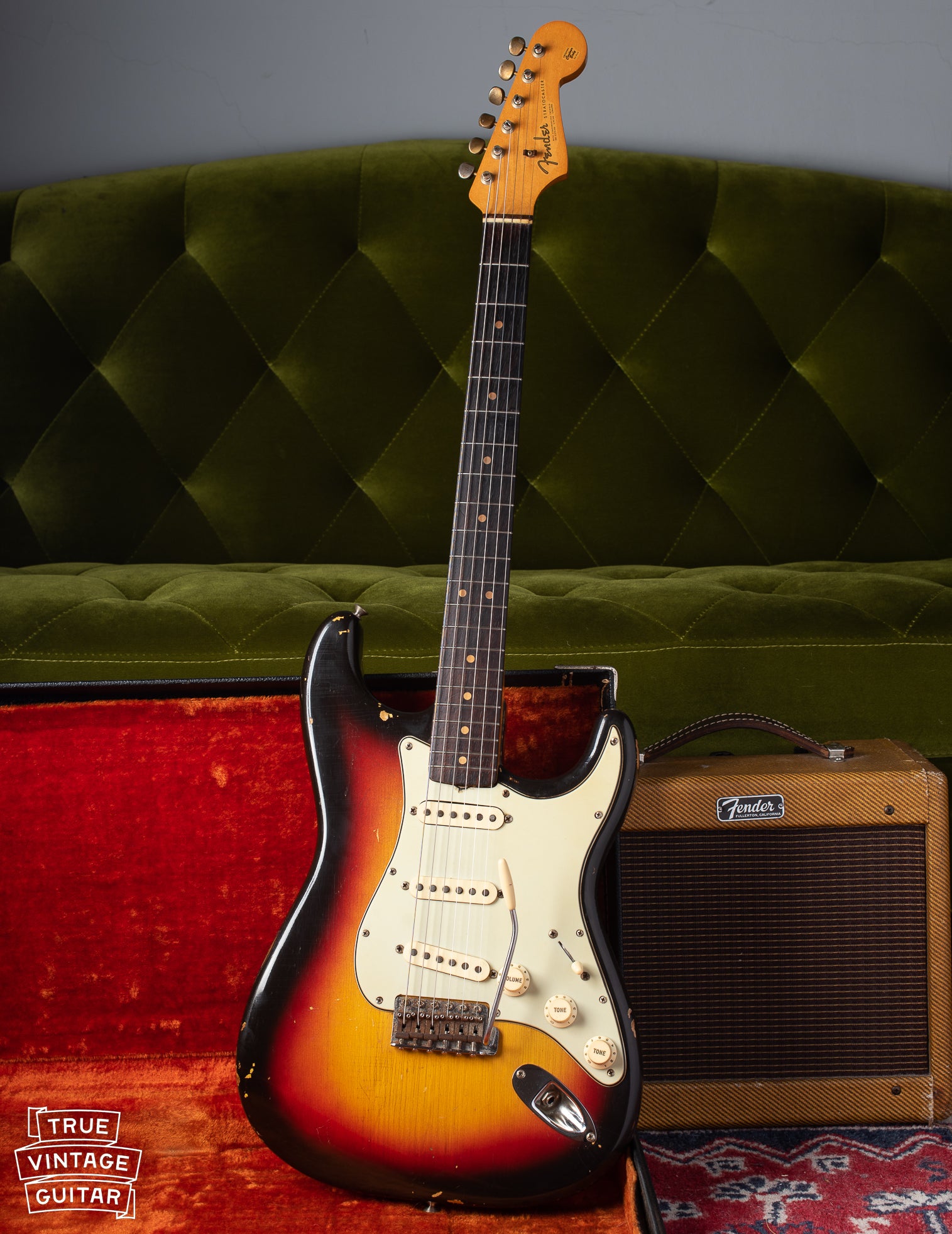 1963 Fender Stratocaster with Sunburst finish, mint green pickguard