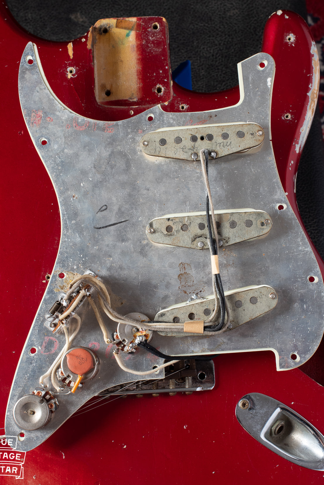 Pickups, potentiometers, switch, wiring, under pickguard of Fender Stratocaster 1964