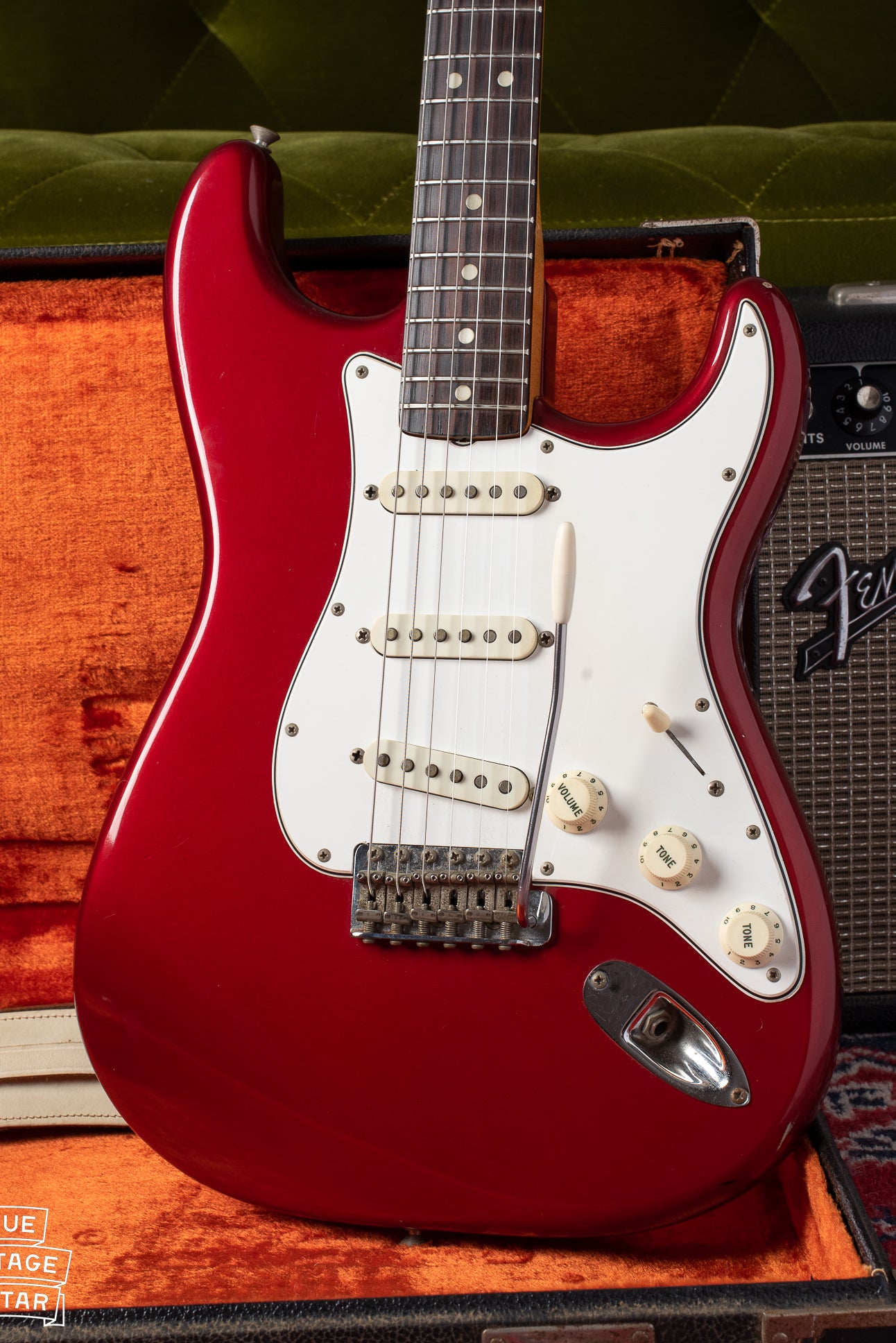 1965 Fender Stratocaster with candy apple red finish and white pickguard
