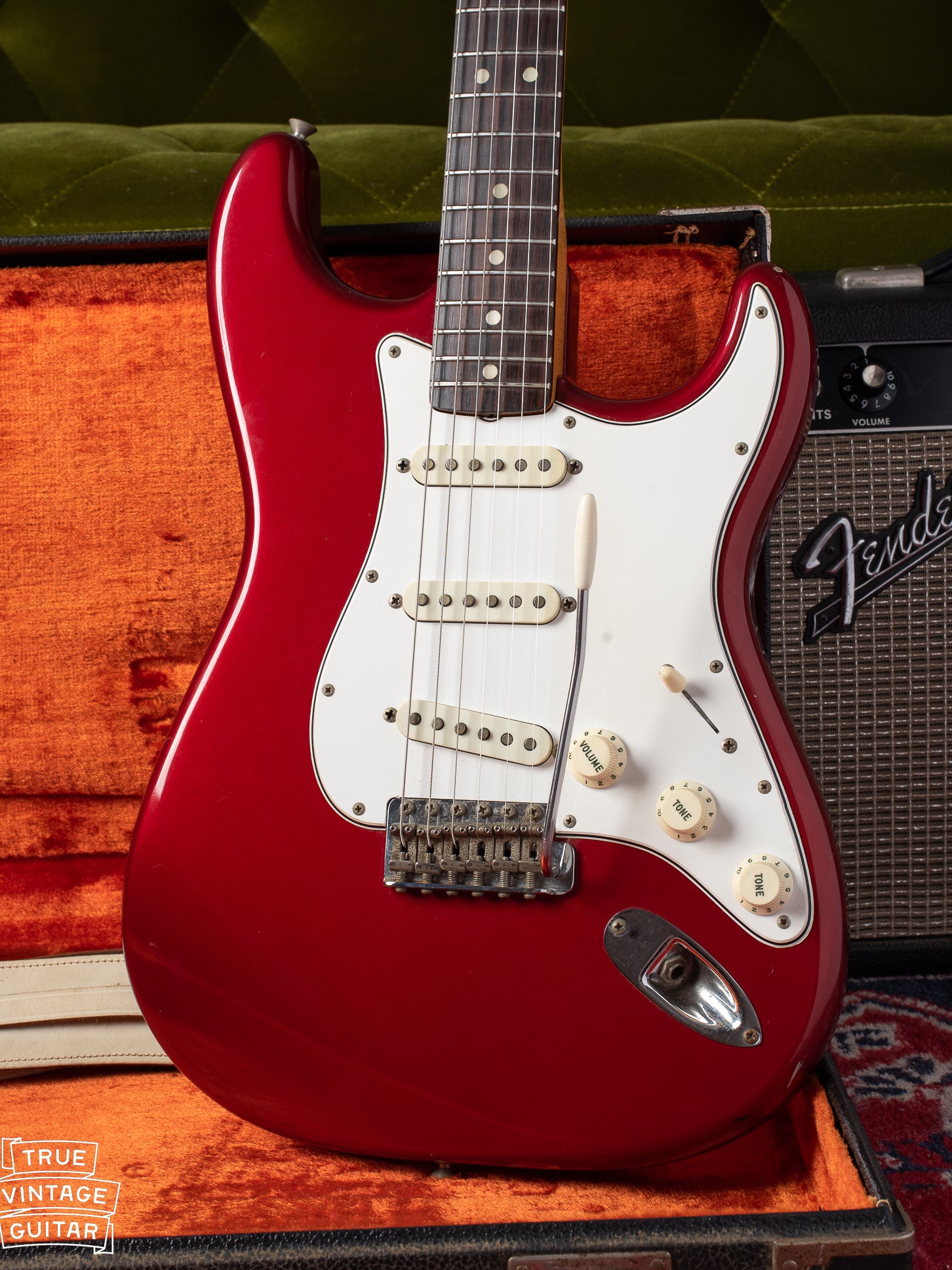 1965 Fender Stratocaster with candy apple red finish and white pickguard