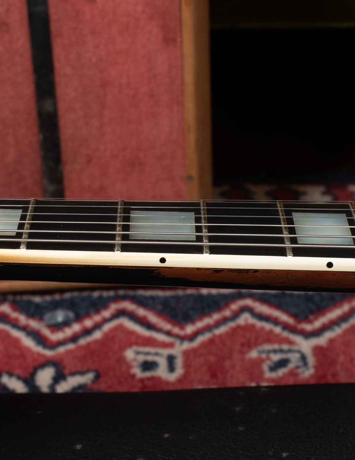 Refret inside the binding preserving the nibs on 1969 Gibson Les Paul Custom.