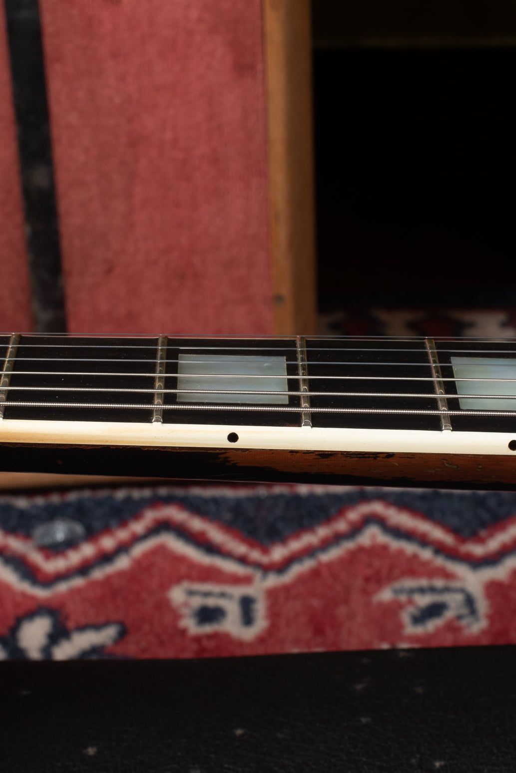 Refret inside the binding preserving the nibs on 1969 Gibson Les Paul Custom.