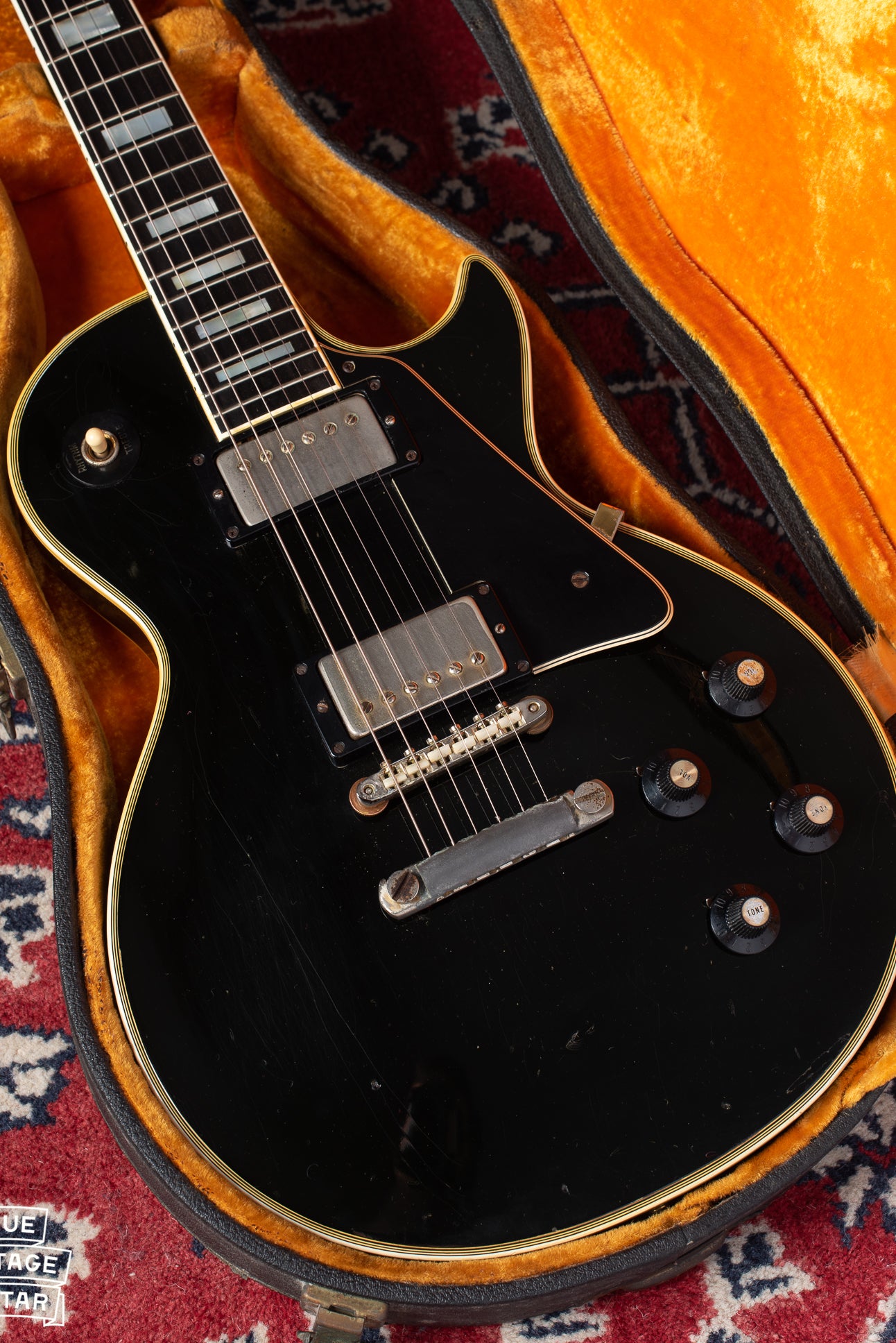 1969 Gibson Les Paul Custom black with gold parts in yellow and black case.