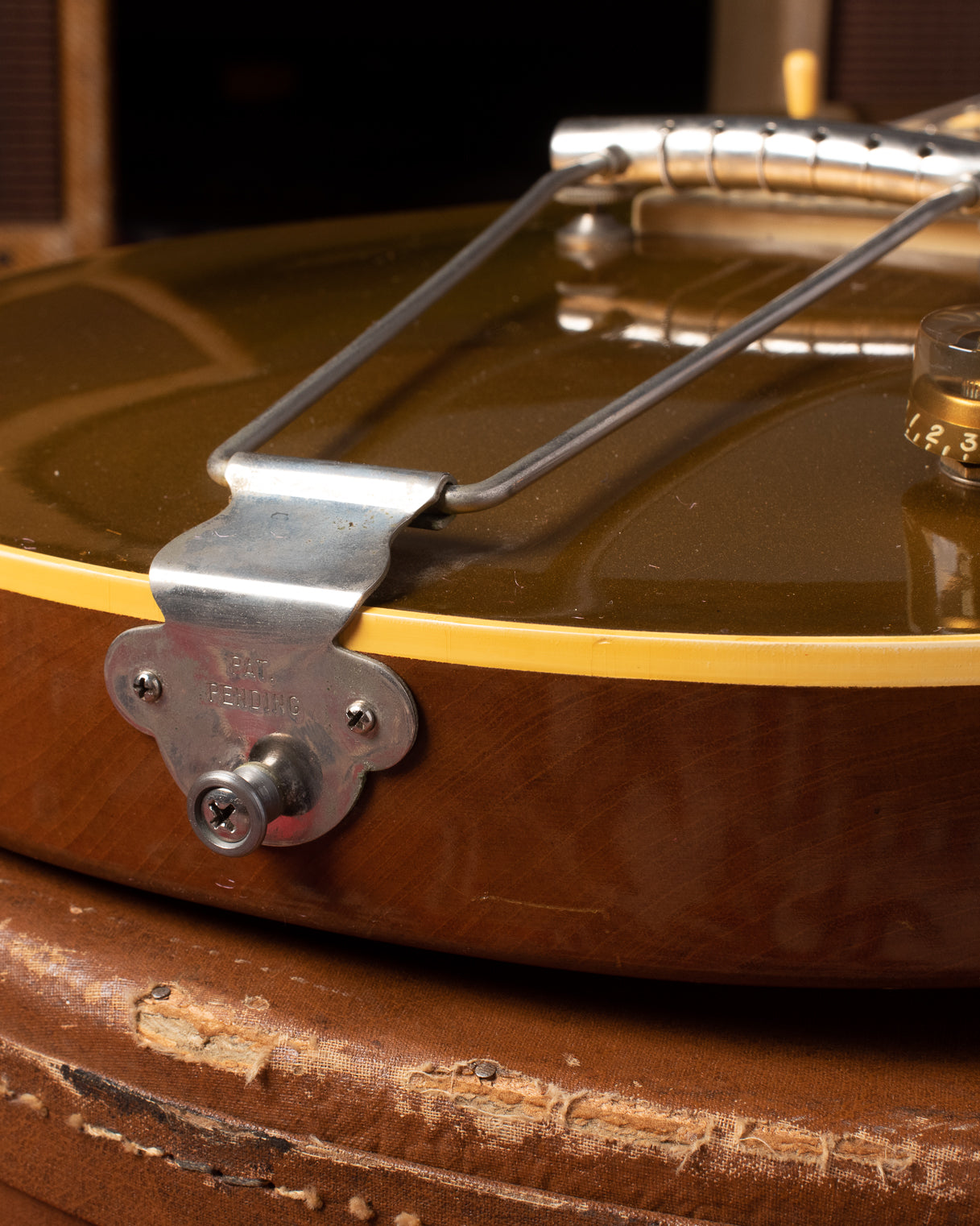 PAT PENDING stamp on trapeze tailpiece