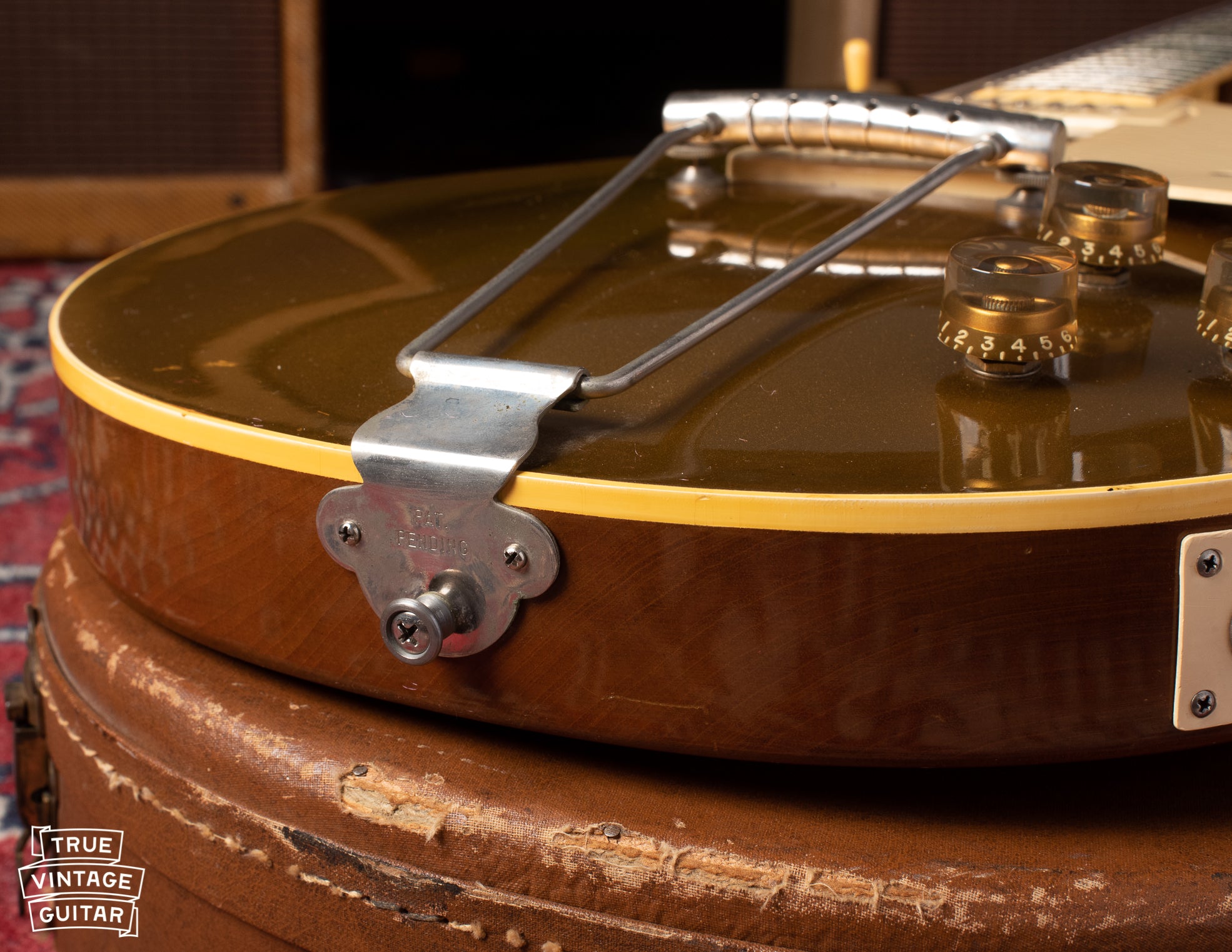 PAT PENDING stamp on trapeze tailpiece