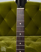 Rosewood fretboard with pearloid dot markers