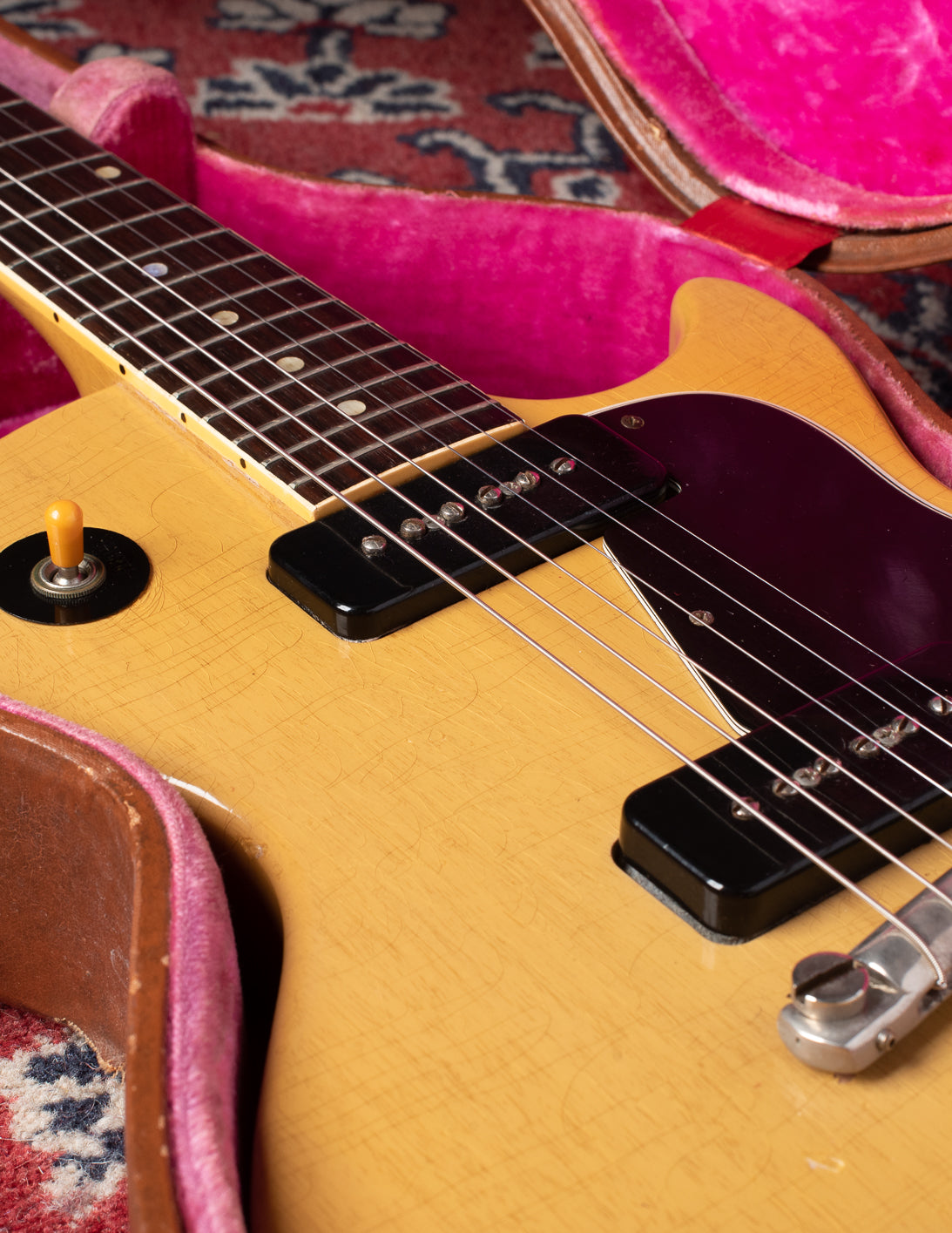 P-90 pickups with black covers