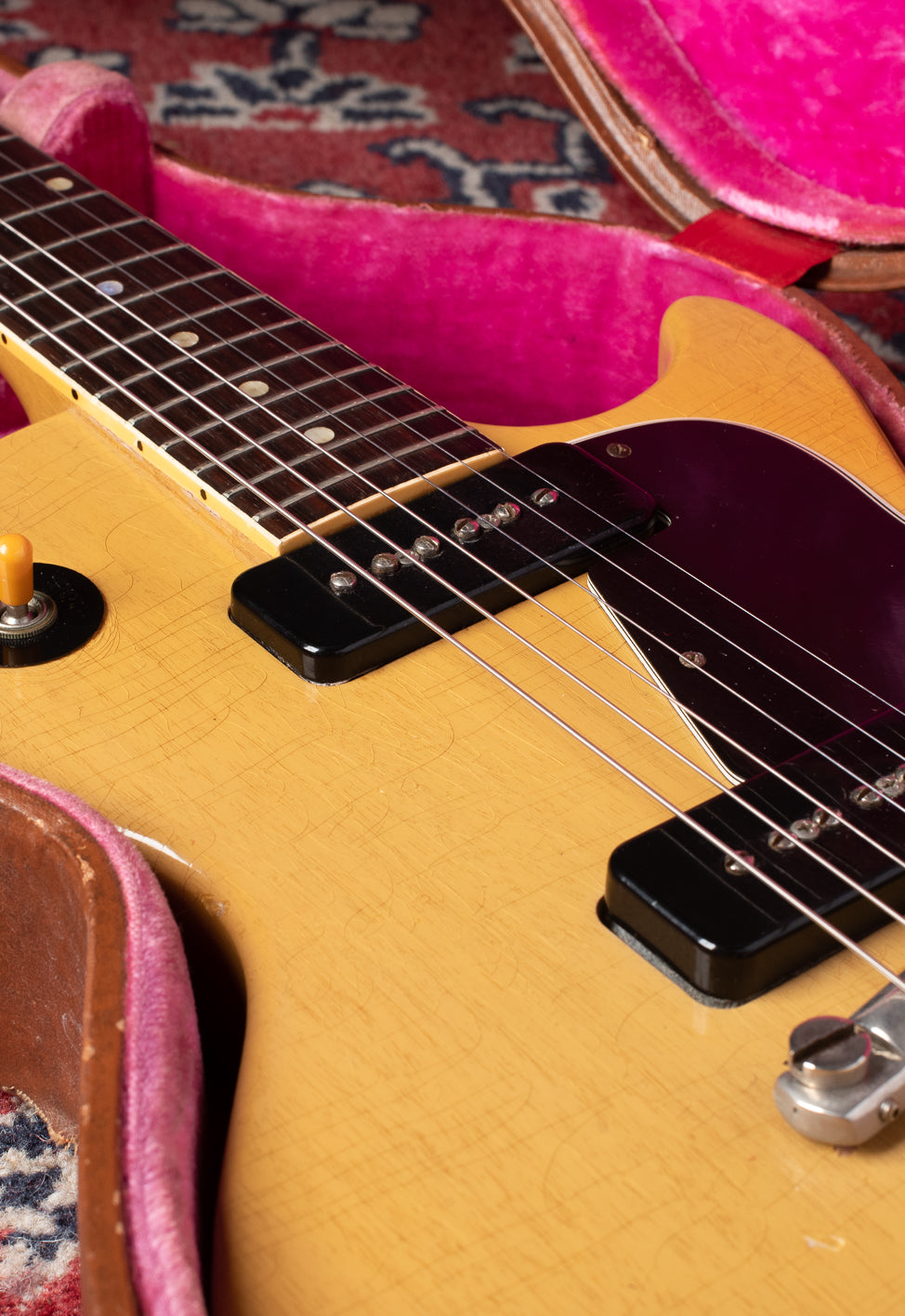 P-90 pickups with black covers