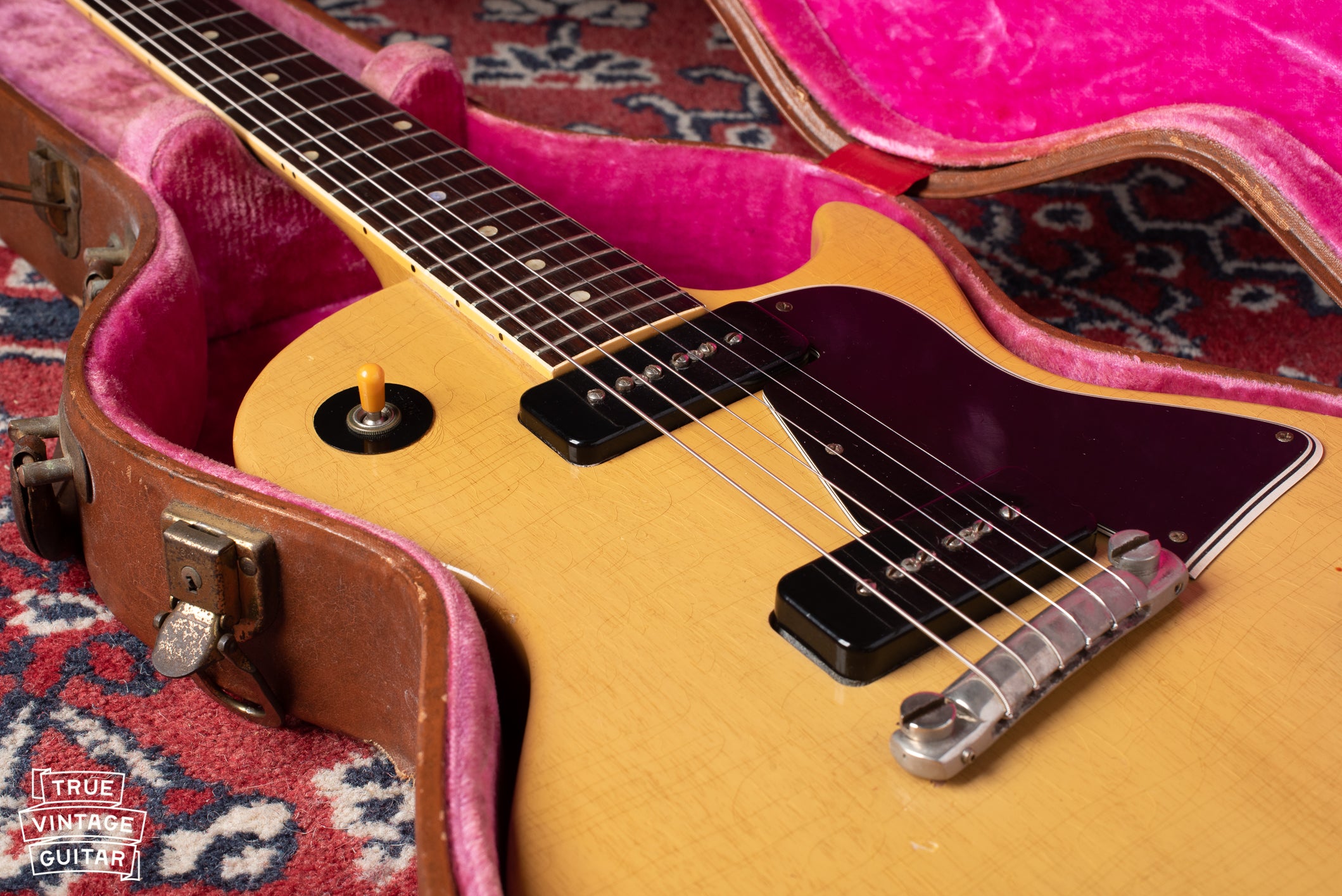 P-90 pickups with black covers