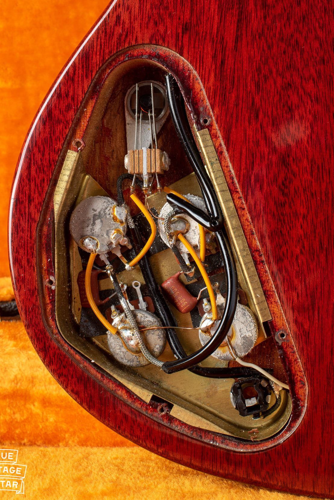 Control cavity of 1969 Gibson SG Standard with potentiometers and switch