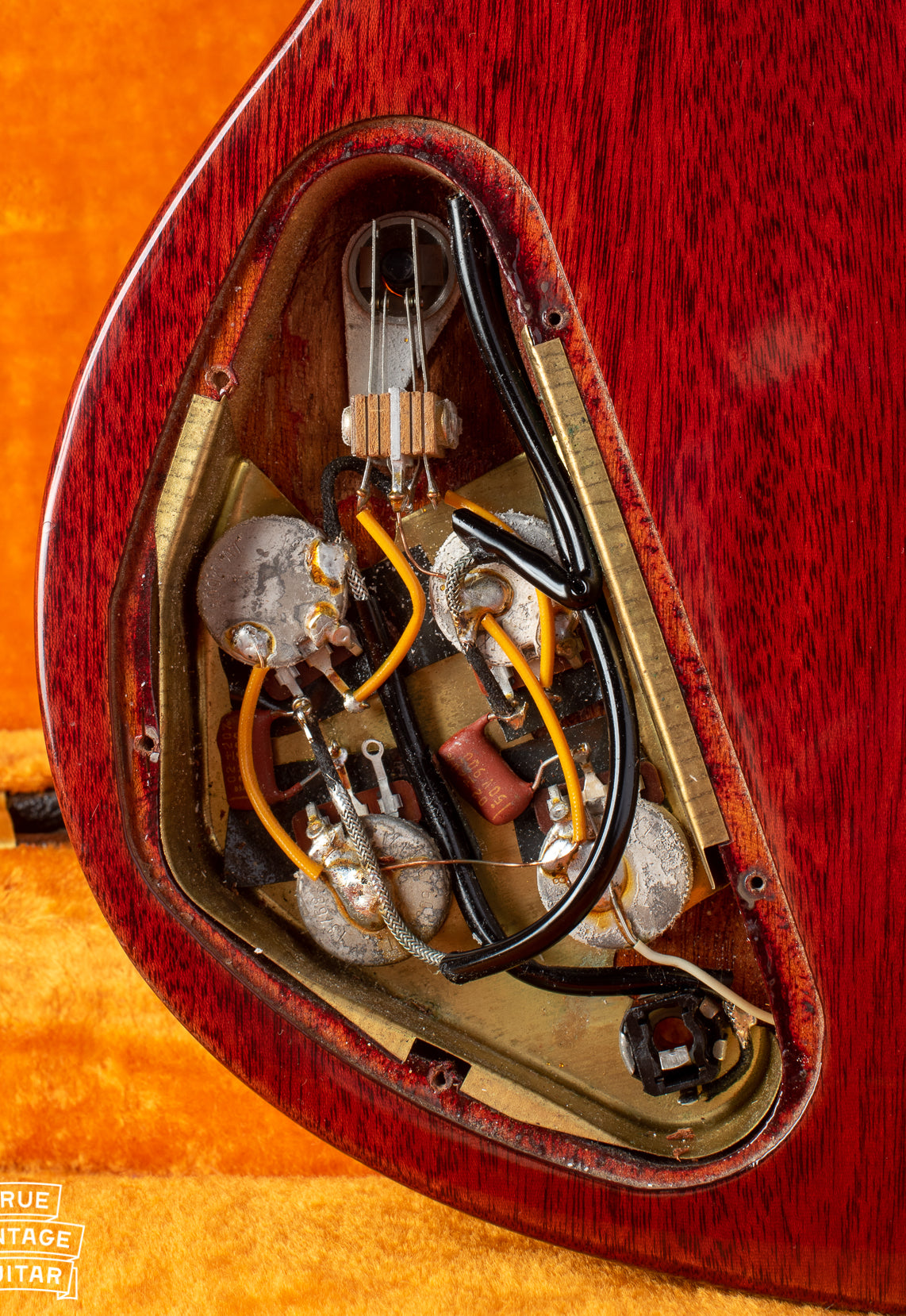 Control cavity of 1969 Gibson SG Standard with potentiometers and switch