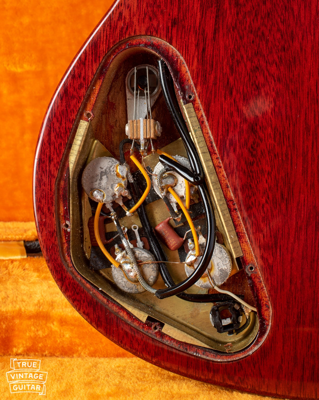 Control cavity of 1969 Gibson SG Standard with potentiometers and switch