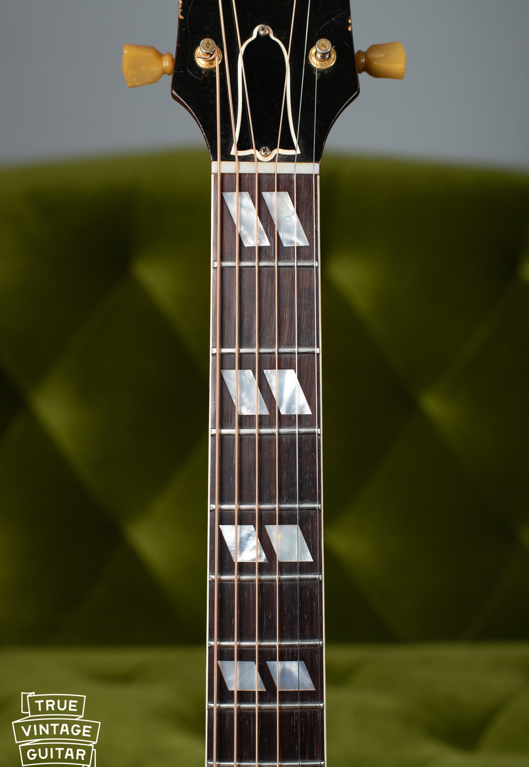 Split parallelogram fretboard inlays