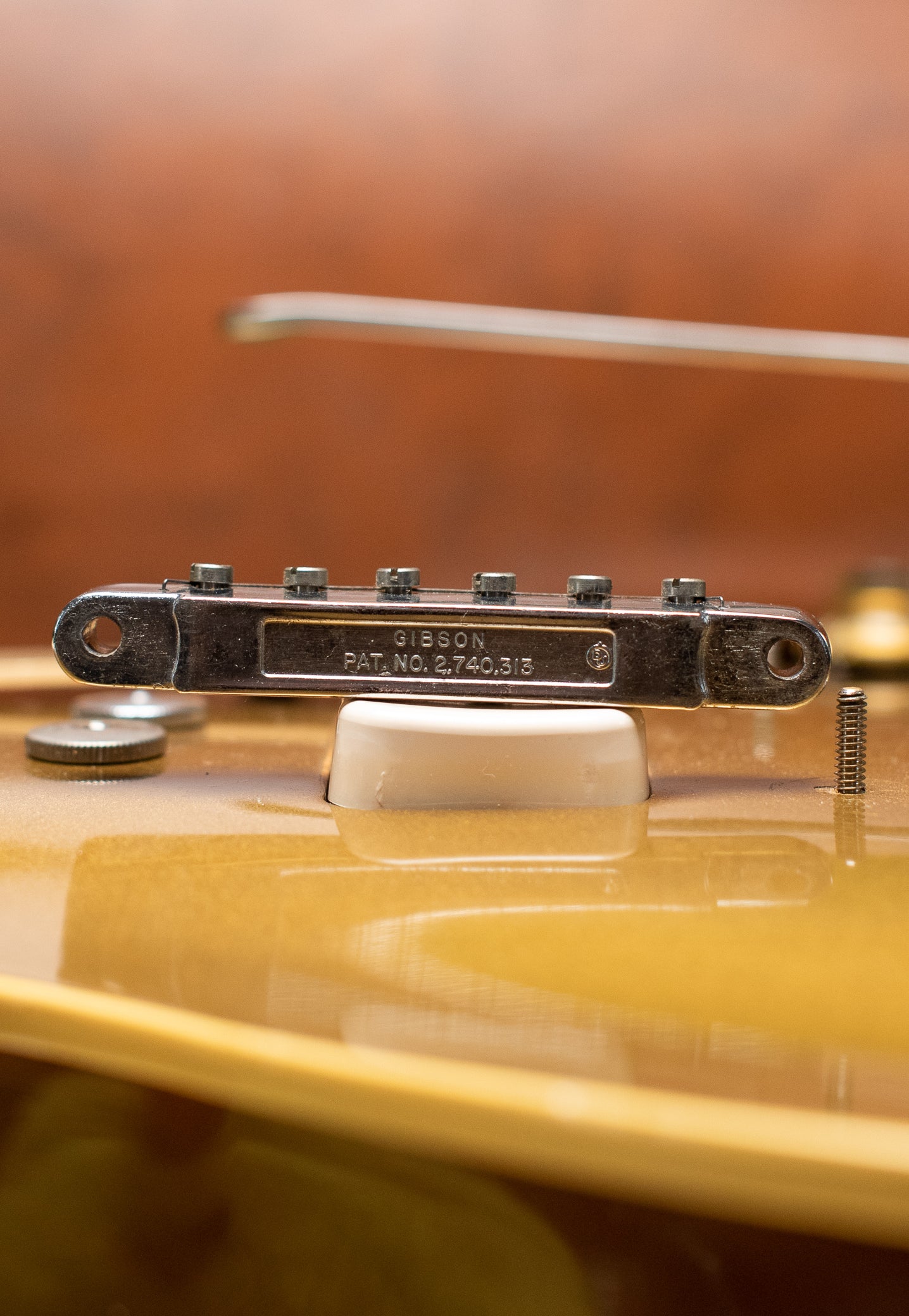 late 1960s chrome Gibson patent number tune-o-matic bridge with nylon saddles