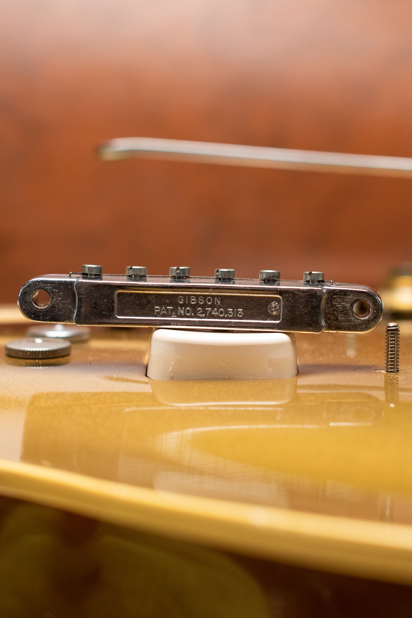 late 1960s chrome Gibson patent number tune-o-matic bridge with nylon saddles