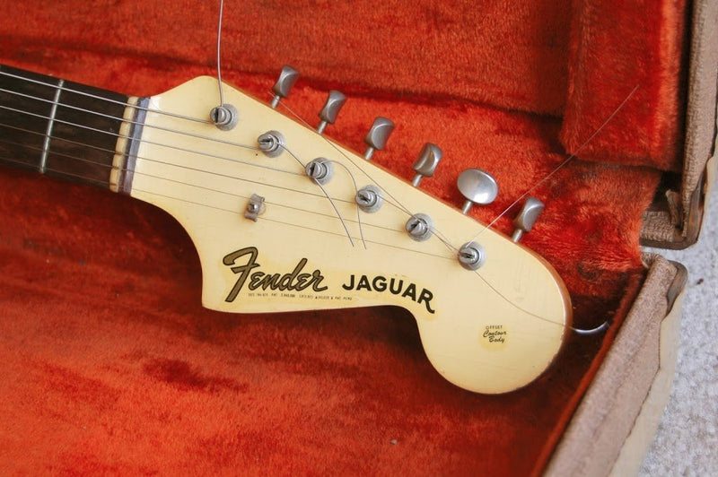 Vintage White Fender Jaguar electric guitar
