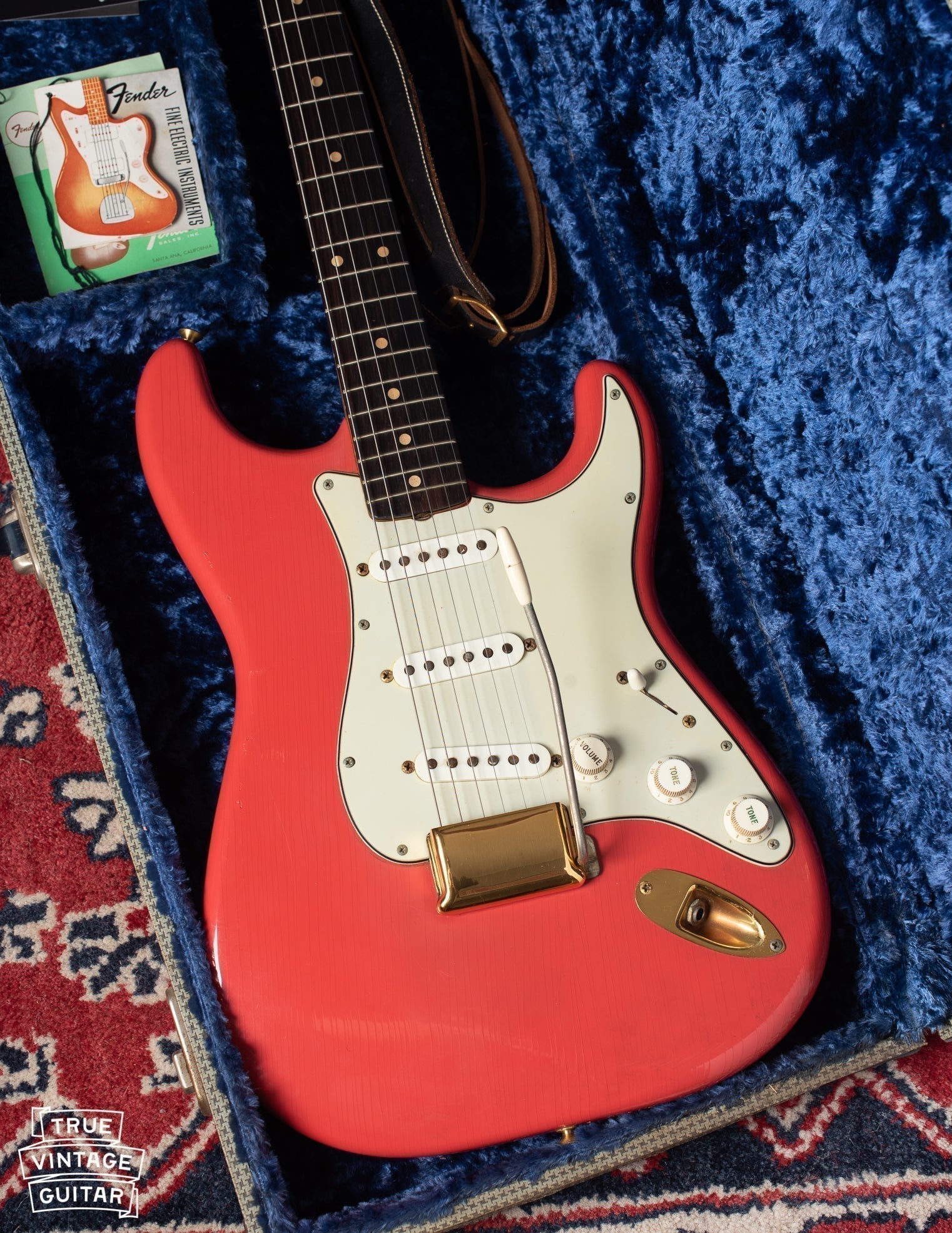 This image shows one of the most valuable vintage Fender Stratocaster guitars we've had at True Vintage Guitar. The guitar is a 1962 Fender Stratocaster in original Fiesta Red finish with gold plated parts.