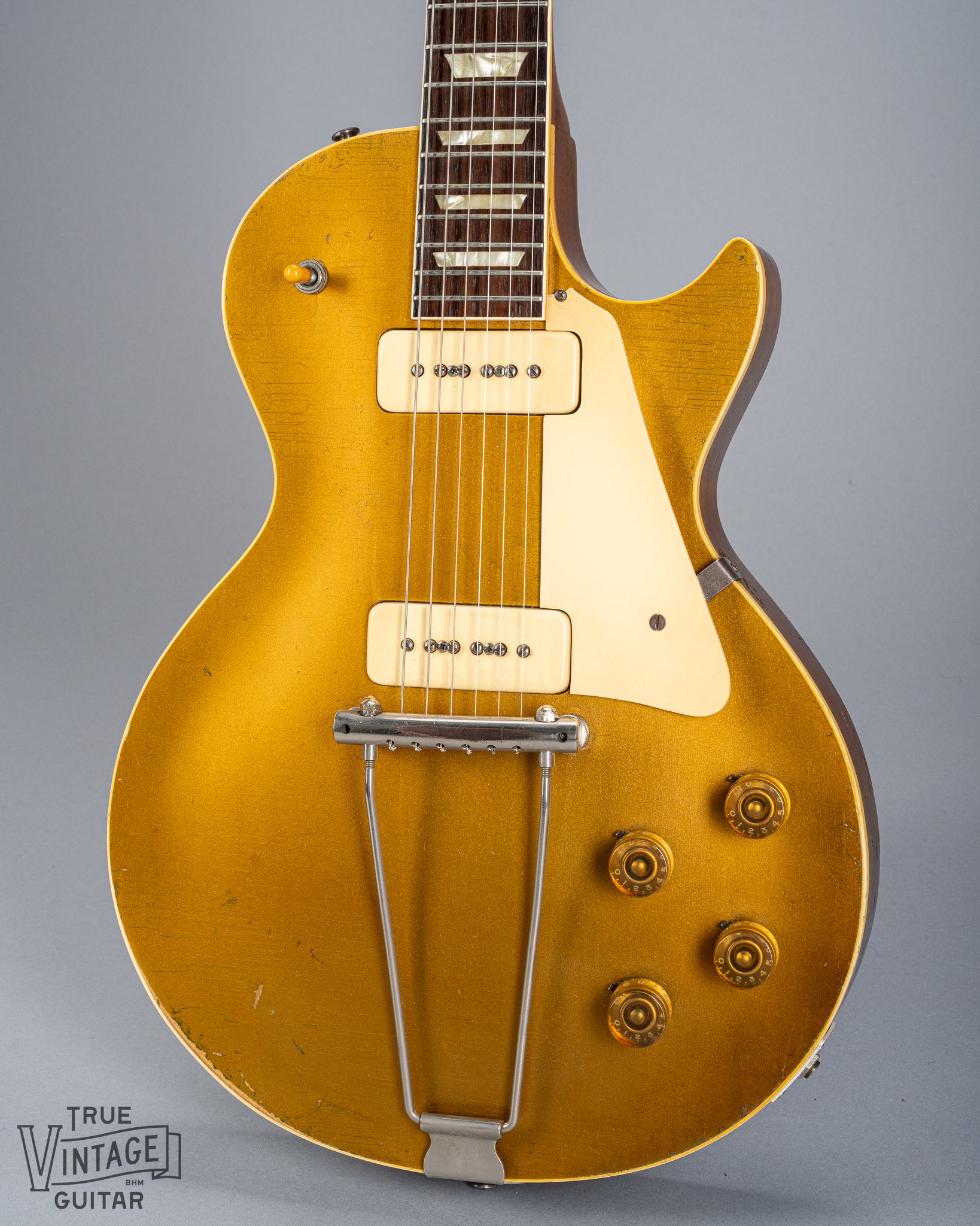 front of 1952 Gibson Les Paul Goldtop guitar body p90 pickups checking switch tip fretboard inlays binding trapeze tailpiece 