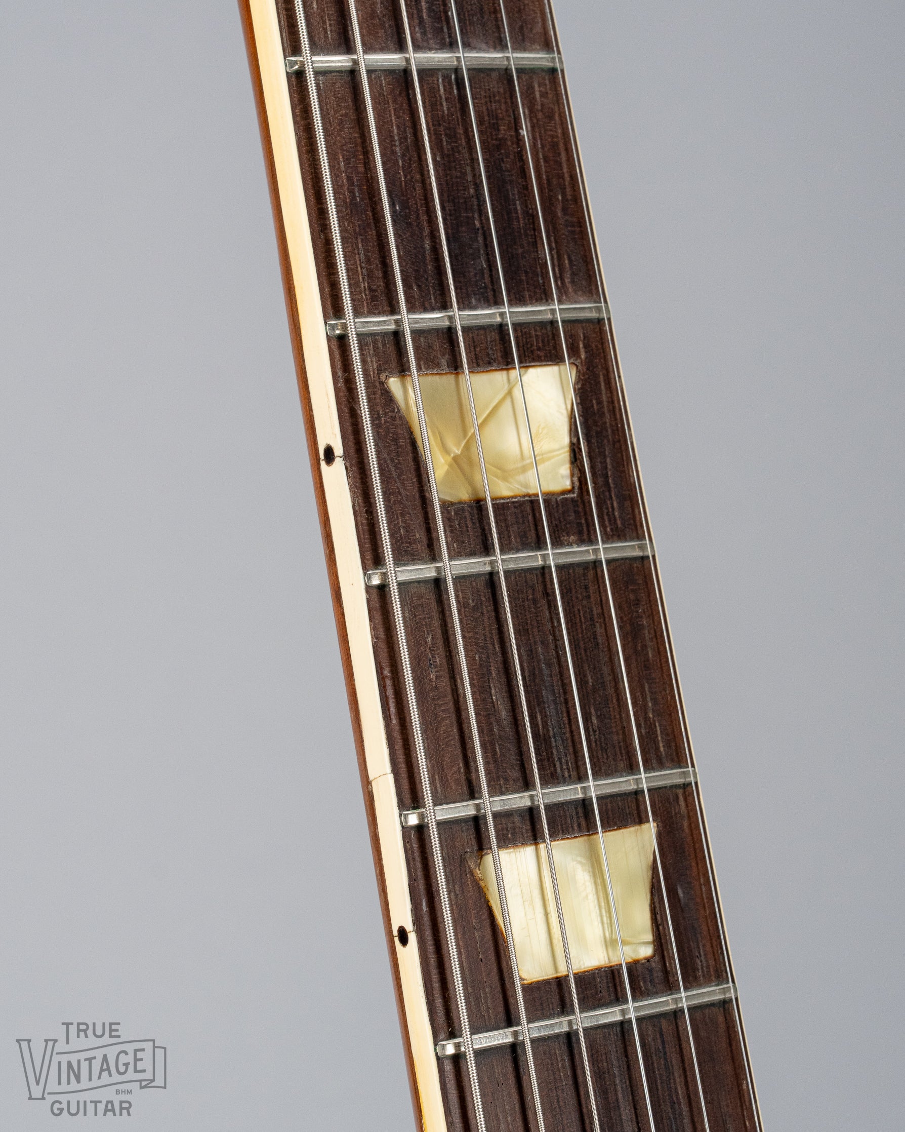 This image shows the neck binding of a 1954 Gibson Les Paul goldtop guitar