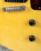 Front of 1959 Gibson Les Paul TV Model body, tortoise pick guard, dog ear p90, double cutaway, TV yellow, volume and tone controls, bridge