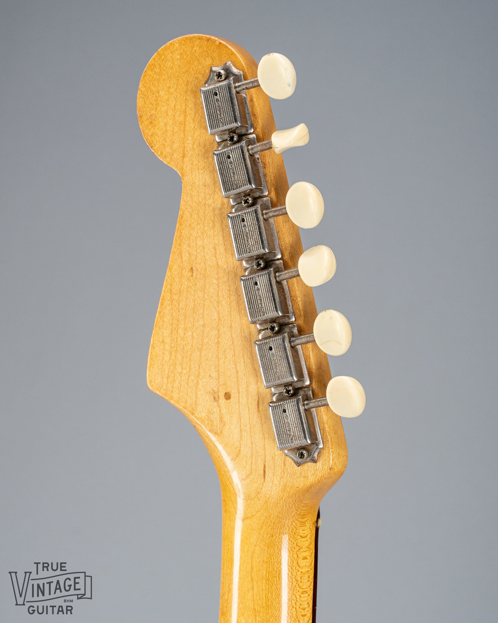 back of 1960 Fender Musicmaster desert sand guitar headstock neck joint tuners 