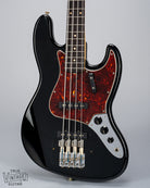 Front of 1962 Fender Jazz Bass custom color black custom color guitar tortoise shell pick guard no bridge and pickup cover