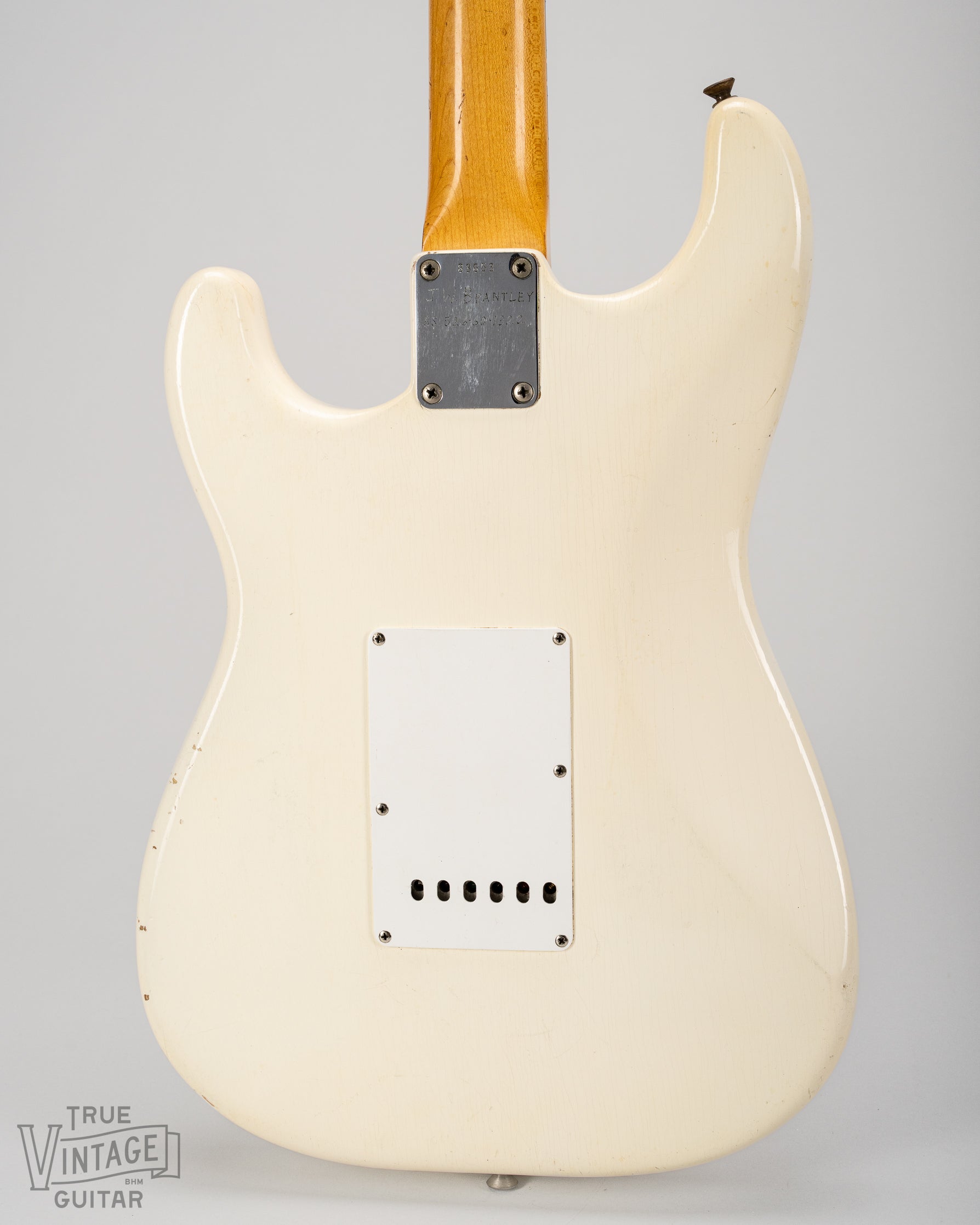 Back of the body of the 1962 Fender Stratocaster Olympic White