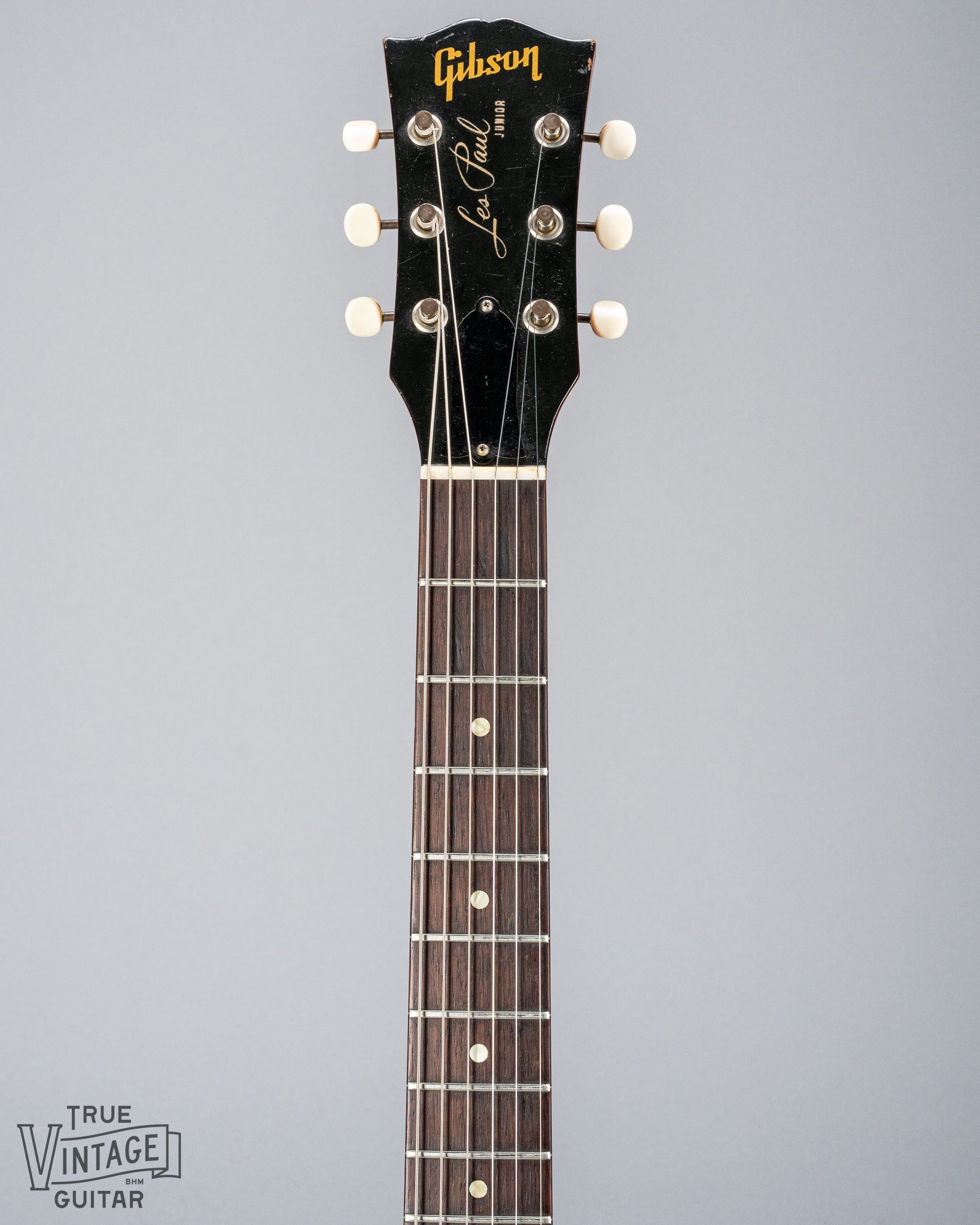 Front of Gibson Les Paul Junior Cherry red guitar neck and headstock