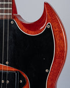 Front of 1964 Gibson SG Junior Cherry body pickguard dog ear P90 horn double cutaway 