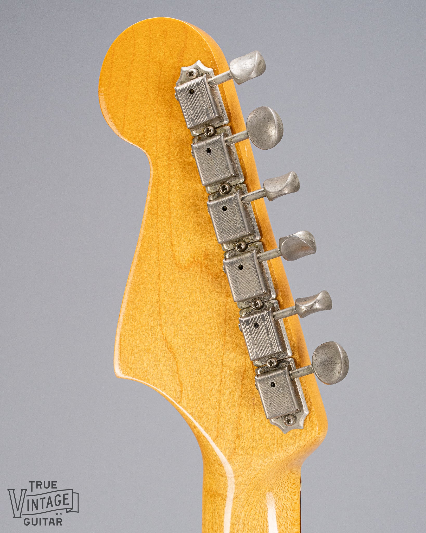 back of 1965 Fender Jazzmaster sunburst guitar headstock and tuners