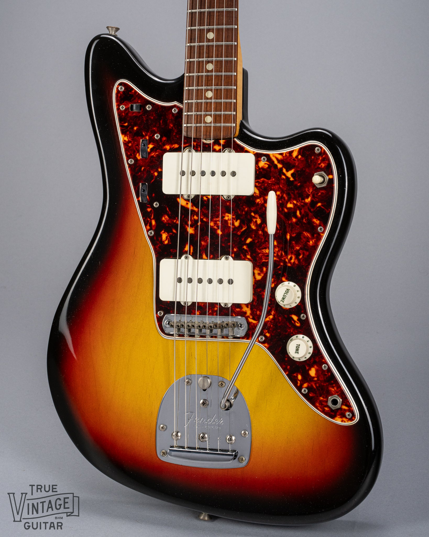 Front of 1965 Fender Jazzmaster sunburst guitar body tortoise shell pickguard pickups bridge tremolo