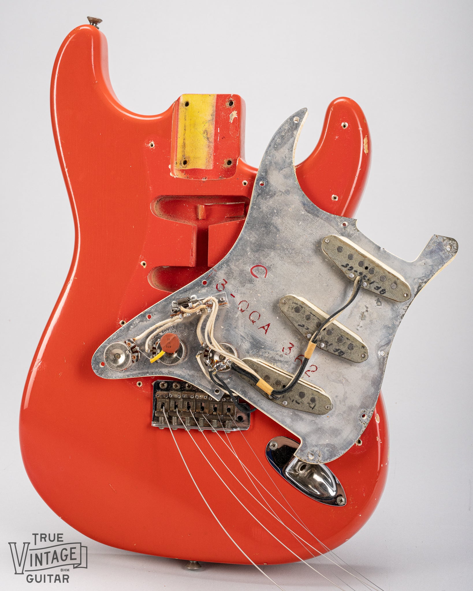 1965 Fender Stratocaster Fiesta Red custom color guitar interior original wiring, solder, and electronics 