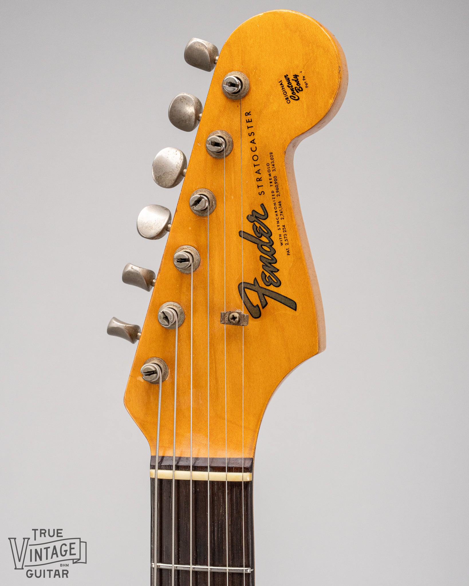 1965 Fender Stratocaster Fiesta Red custom color guitar front of headstock transition logo