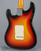 back of 1965 Fender Stratocaster Sunburst guitar body trem plate neck plate