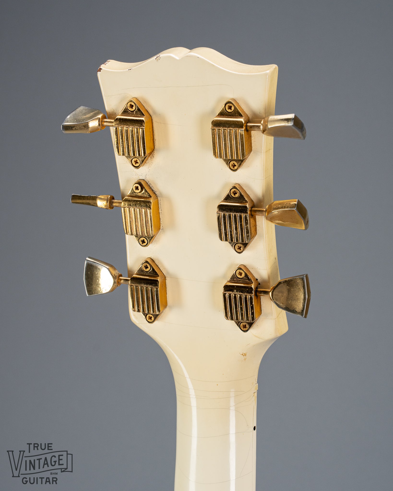 back of 1965 Gibson SG Custom white guitar three pickup with Bigsby B5 vibrato tailpiece headstock