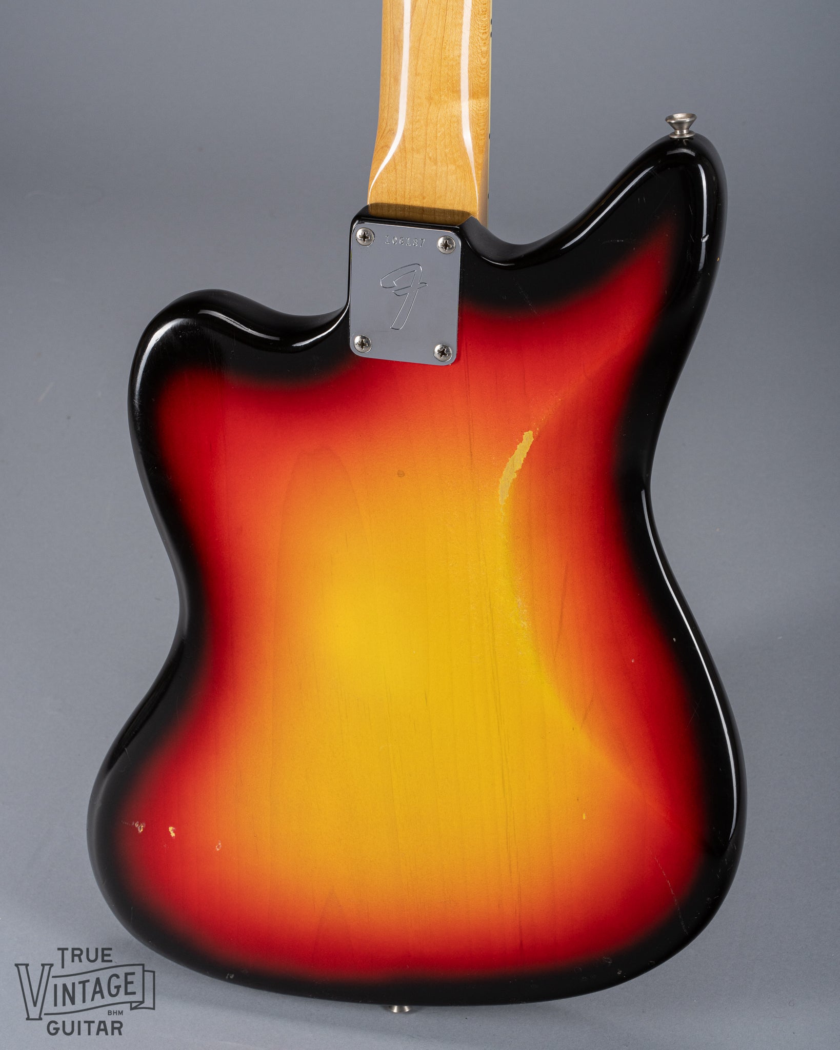 Back of 1965 Fender Jaguar Sunburst Neck Plate Serial Number F Logo Neck Plate Fretboard Binding Tortoise Shell Pick Guard Offset 