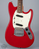 front of 1965 Fender Mustang Red guitar body sparkle pick guard single coils original hardware bridge