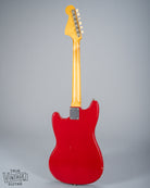 Back of 1965 Fender Mustang Red guitar neck plate serial number neck headstock tuning machines 