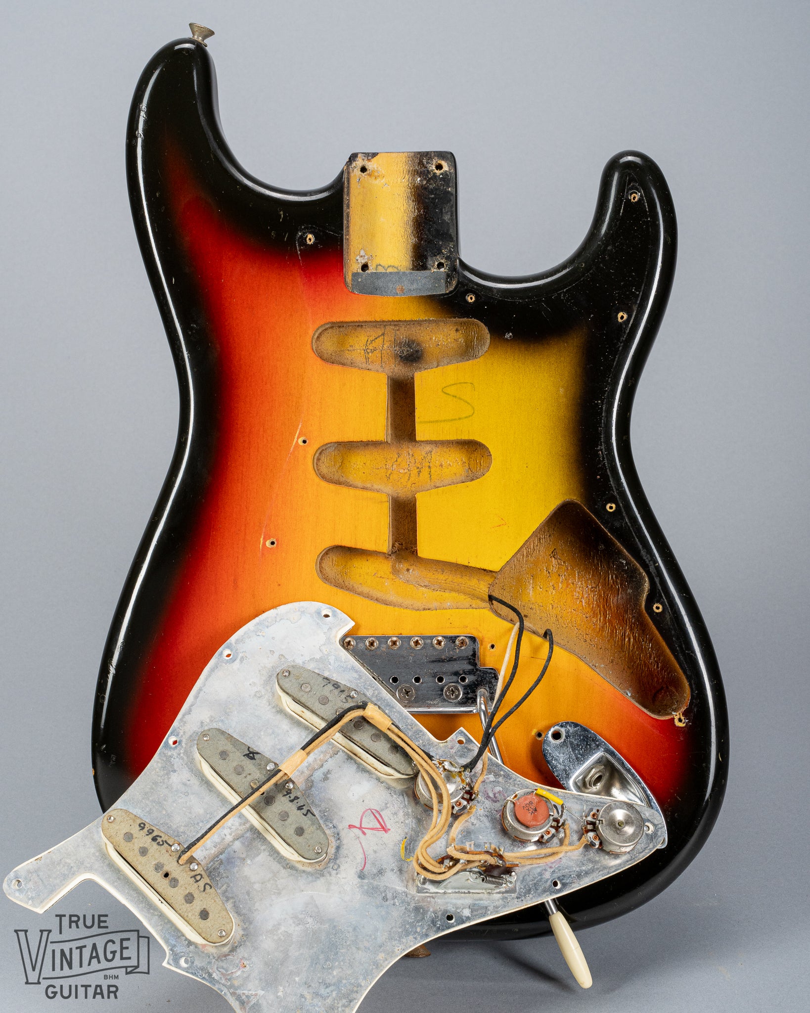 1965 Fender Stratocaster Sunburst under the pickguard pickups wiring electronics pots pickup route and cavity