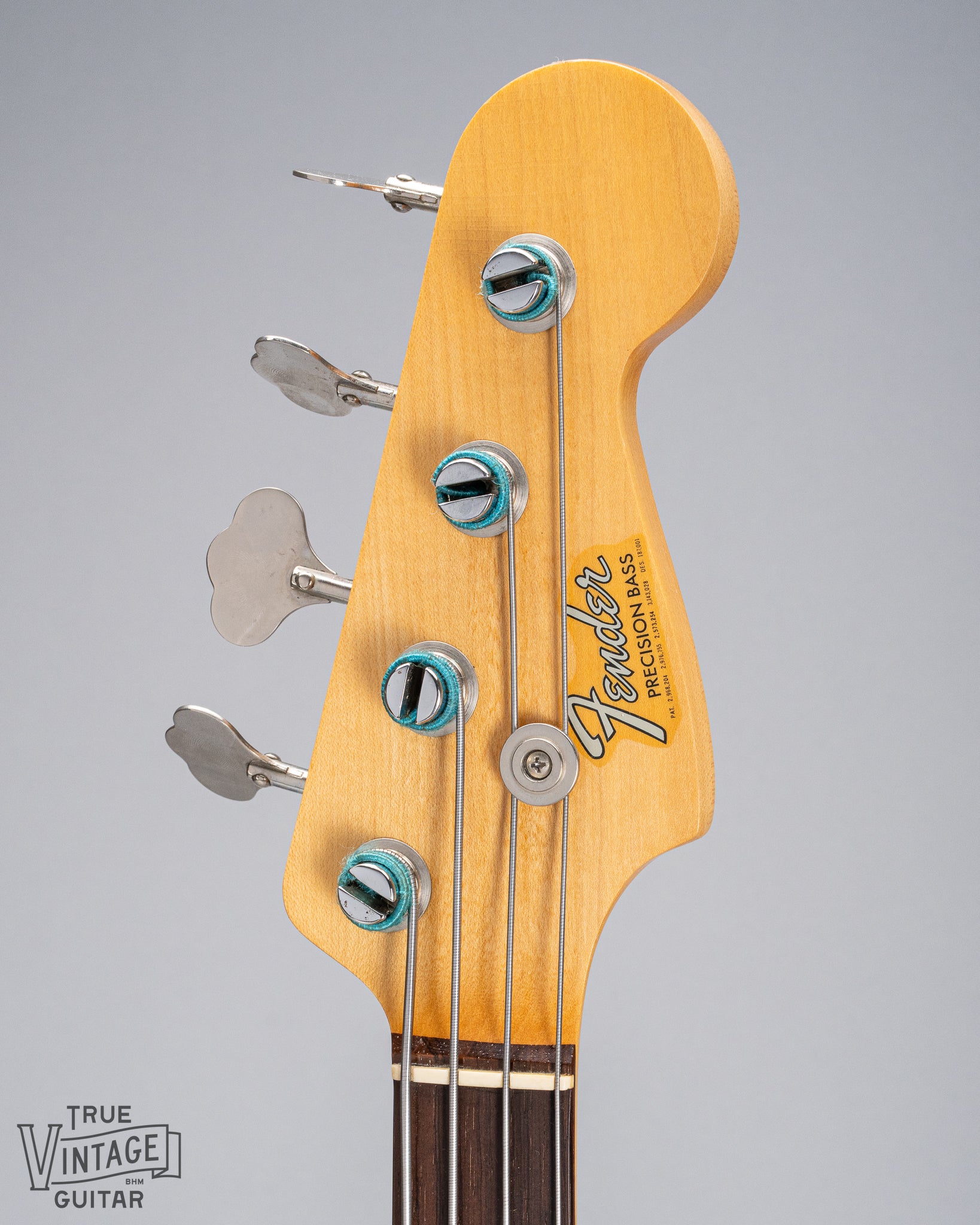 front of 1966 Fender Precision Bass Blond bass guitar headstock Fender logo Tuners original strings 