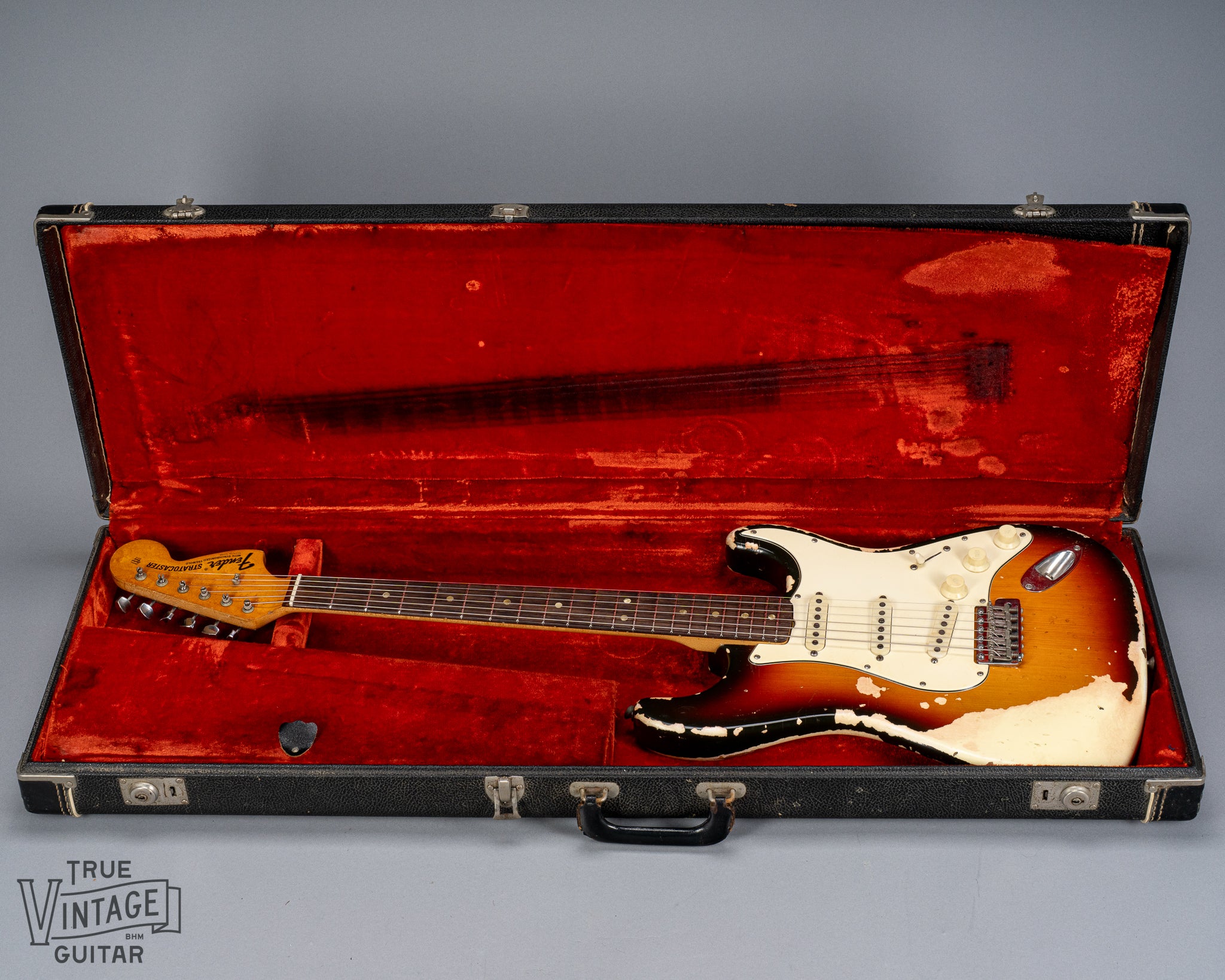 front of 1970 Fender Stratocaster sunburst over white finish distress original pickups bridge  neck and fret board original case