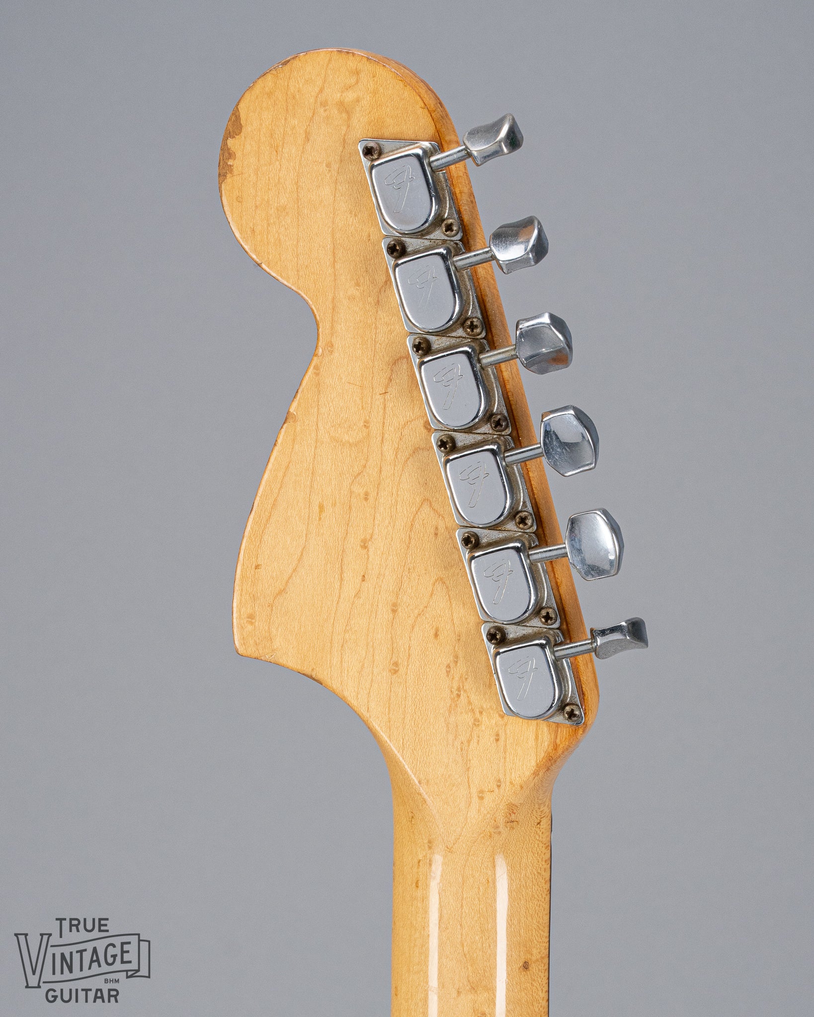 back of 1970 Fender Stratocaster sunburst over white headstock Fender logo tuners