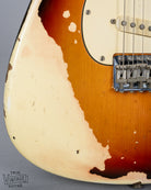 front of 1970 Fender Stratocaster sunburst over white finish distress 