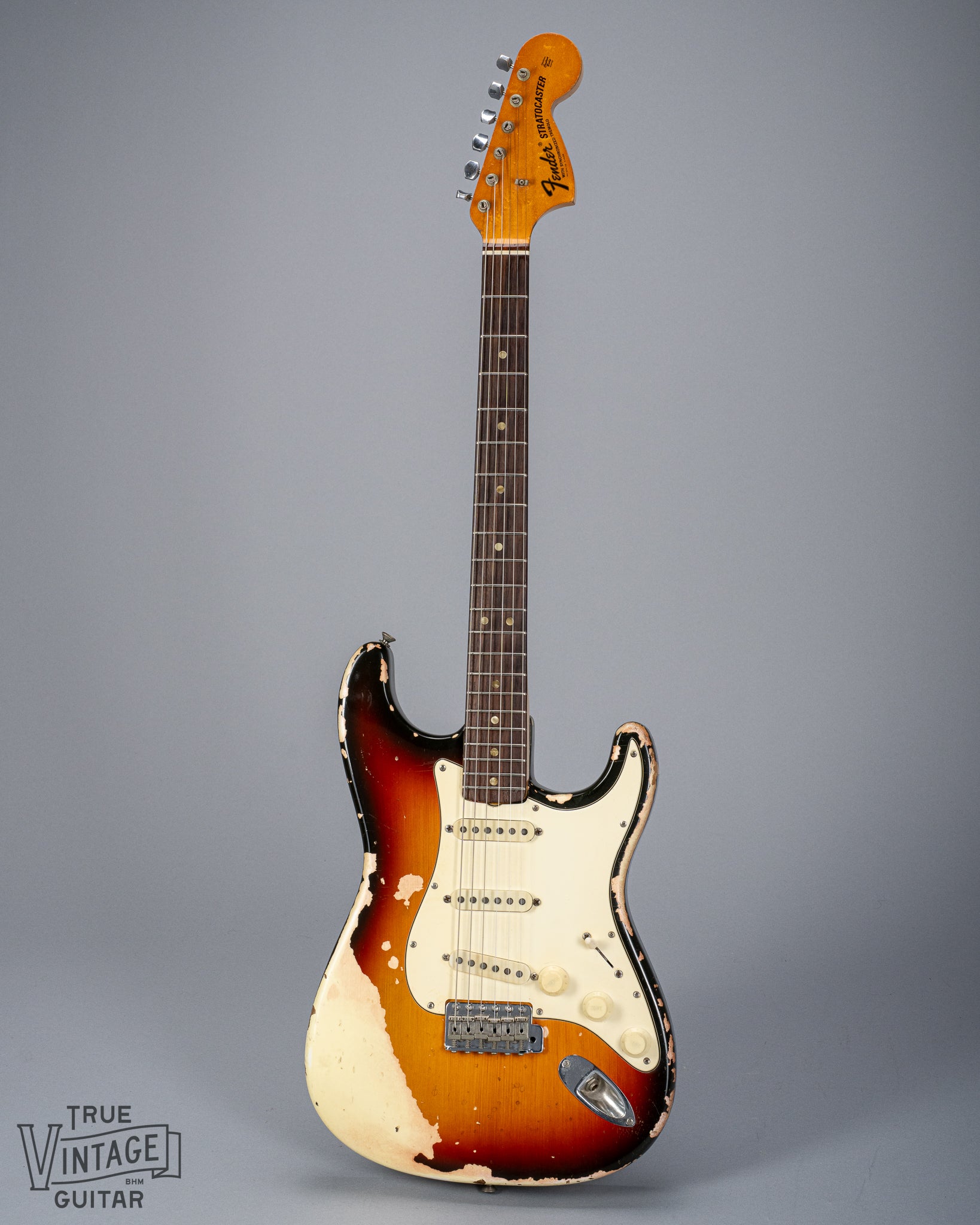 full front of 1970 Fender Stratocaster sunburst over white finish distress original pickups bridge neck and headstock