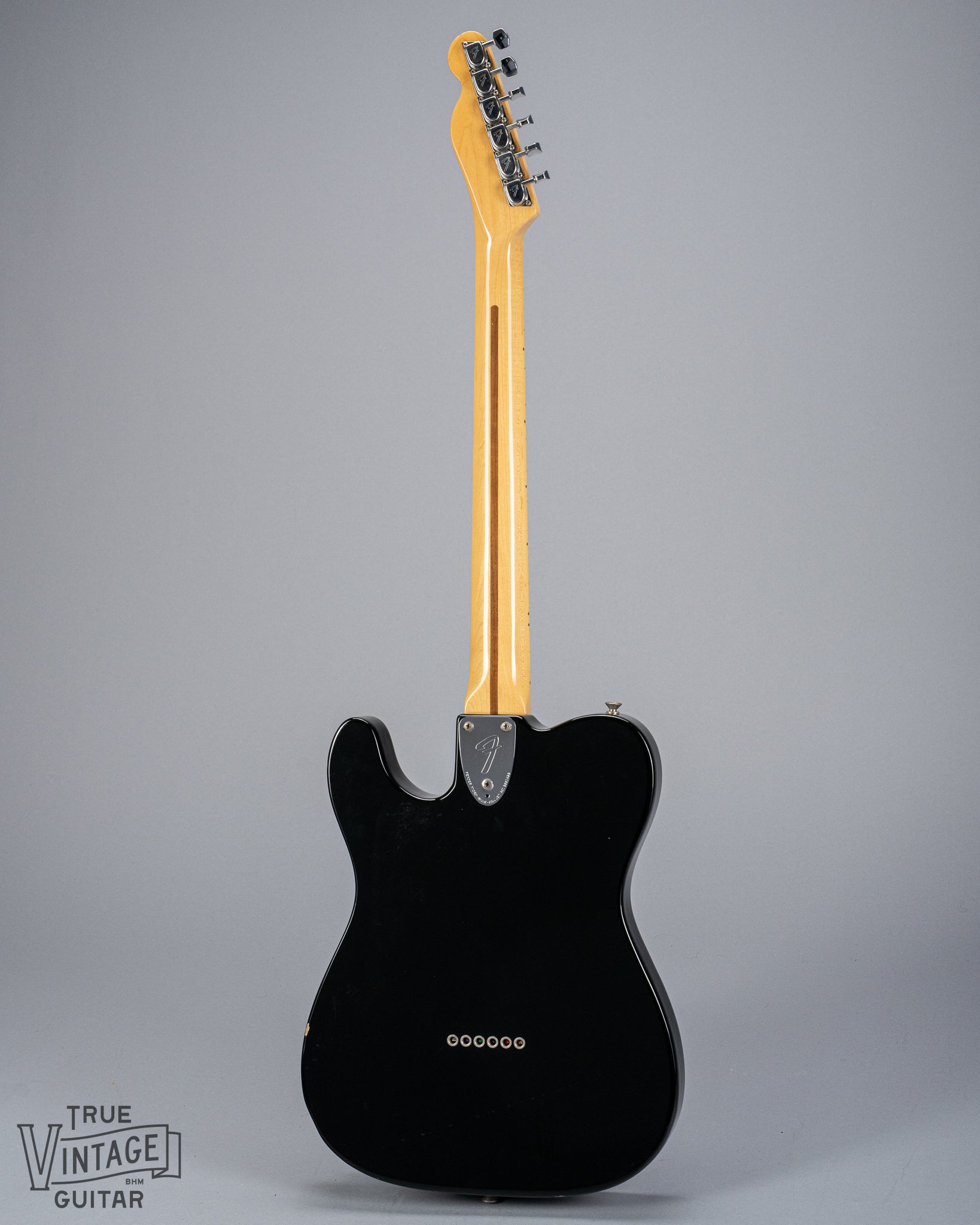 back of 1978 Fender Telecaster Thinline Black guitar body semi hollow 3 bolt neck and headstock tuners