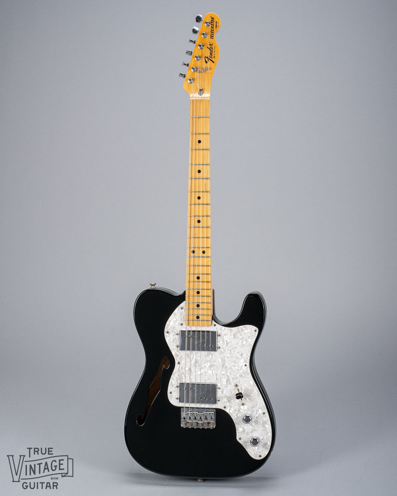 front of 1978 Fender Telecaster Thinline Black guitar body semi hollow humbuckers sparkle guard fretboard and headstock