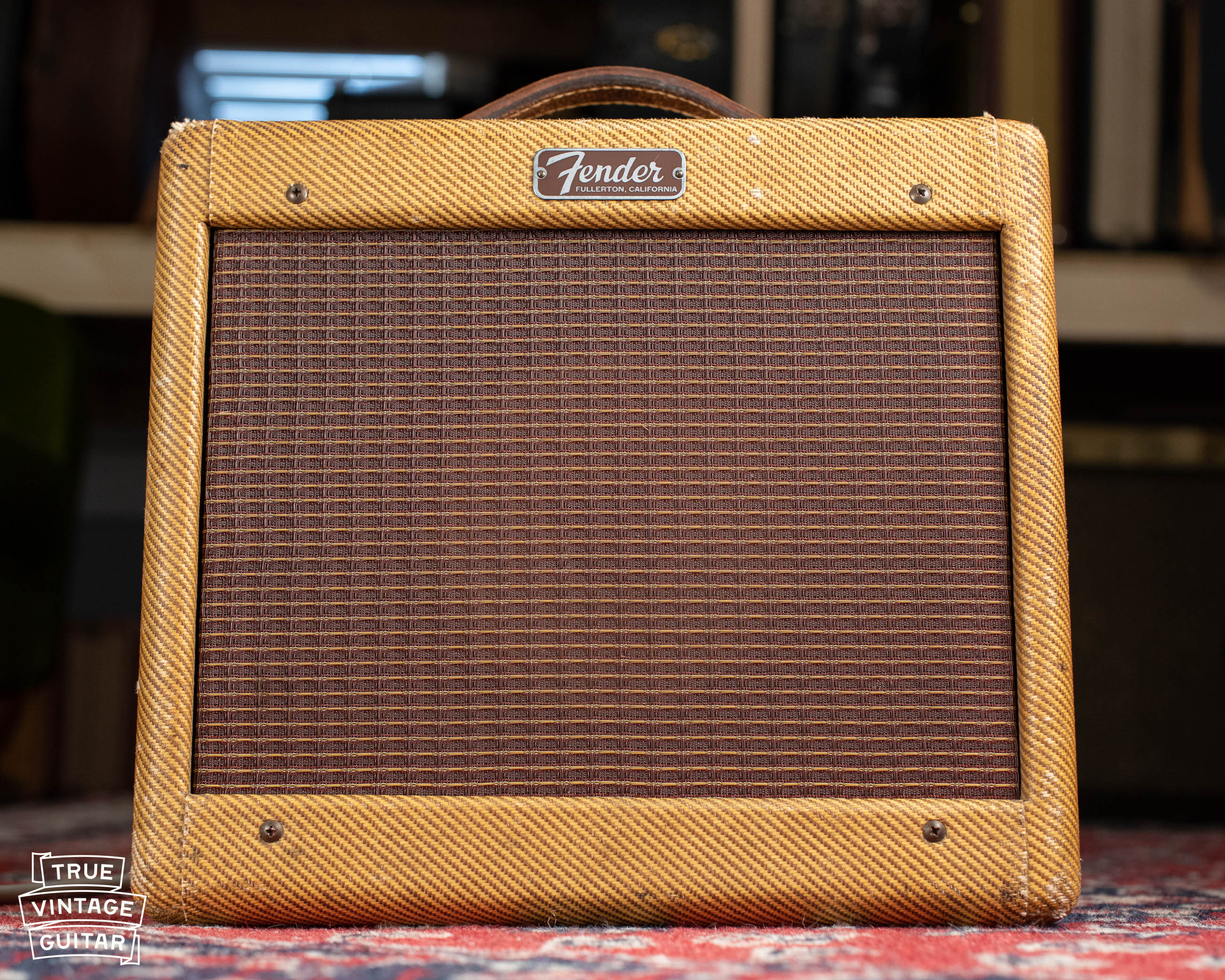 Vintage 1957 Fender Champ guitar amp tweed