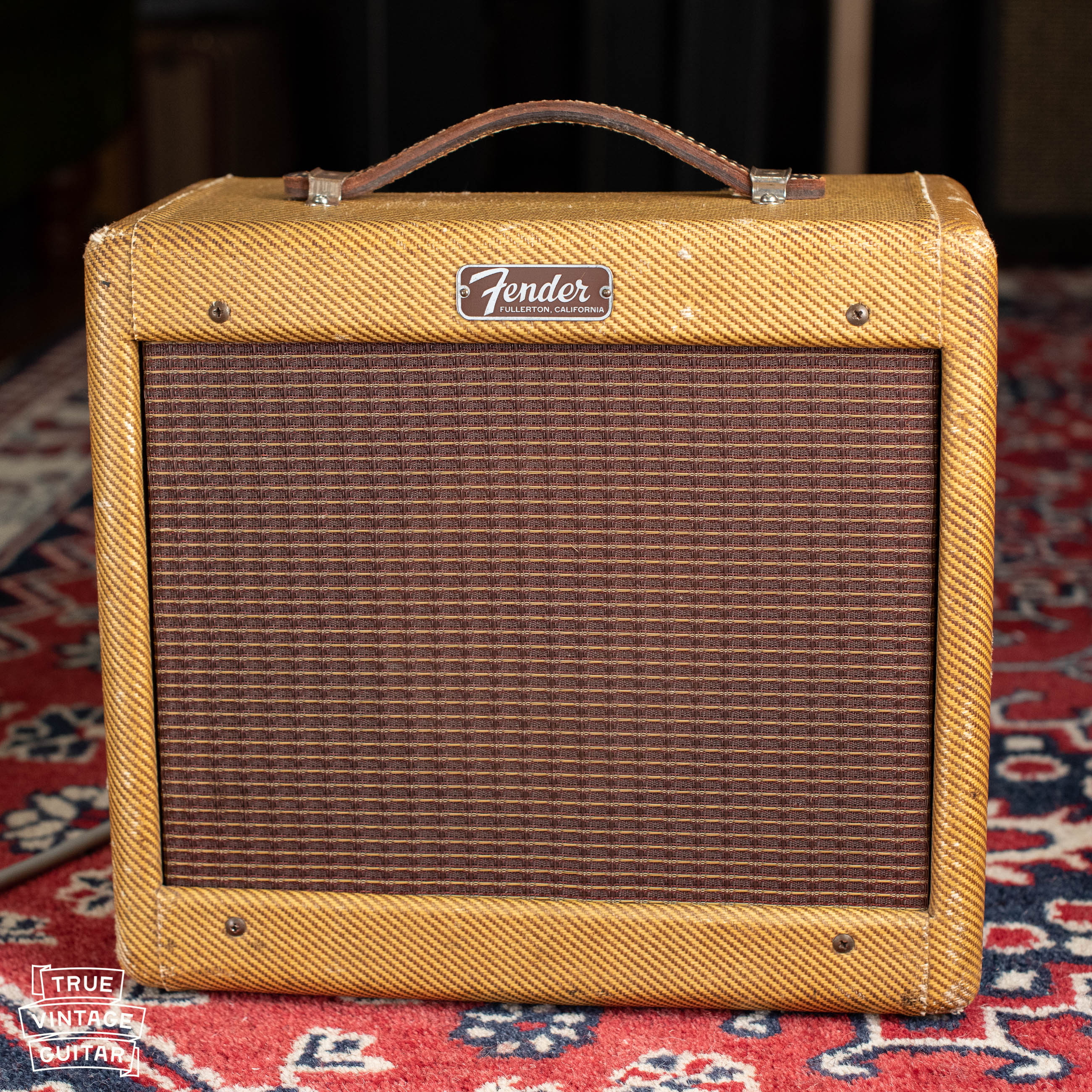 Vintage 1957 Fender Champ guitar amp tweed