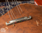 1960 Gibson stop bar tailpiece