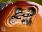 Control cavity, potentiometers, black Sprague capacitors, Vintage 1972 Gibson Les Paul Deluxe electric guitar